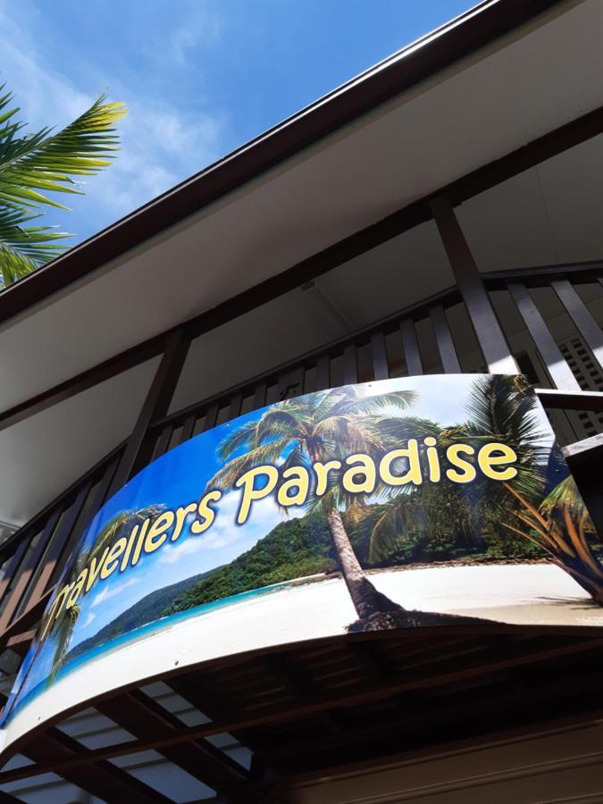 Travellers Paradise Кернс Екстериор снимка The sign at the entrance of the resort