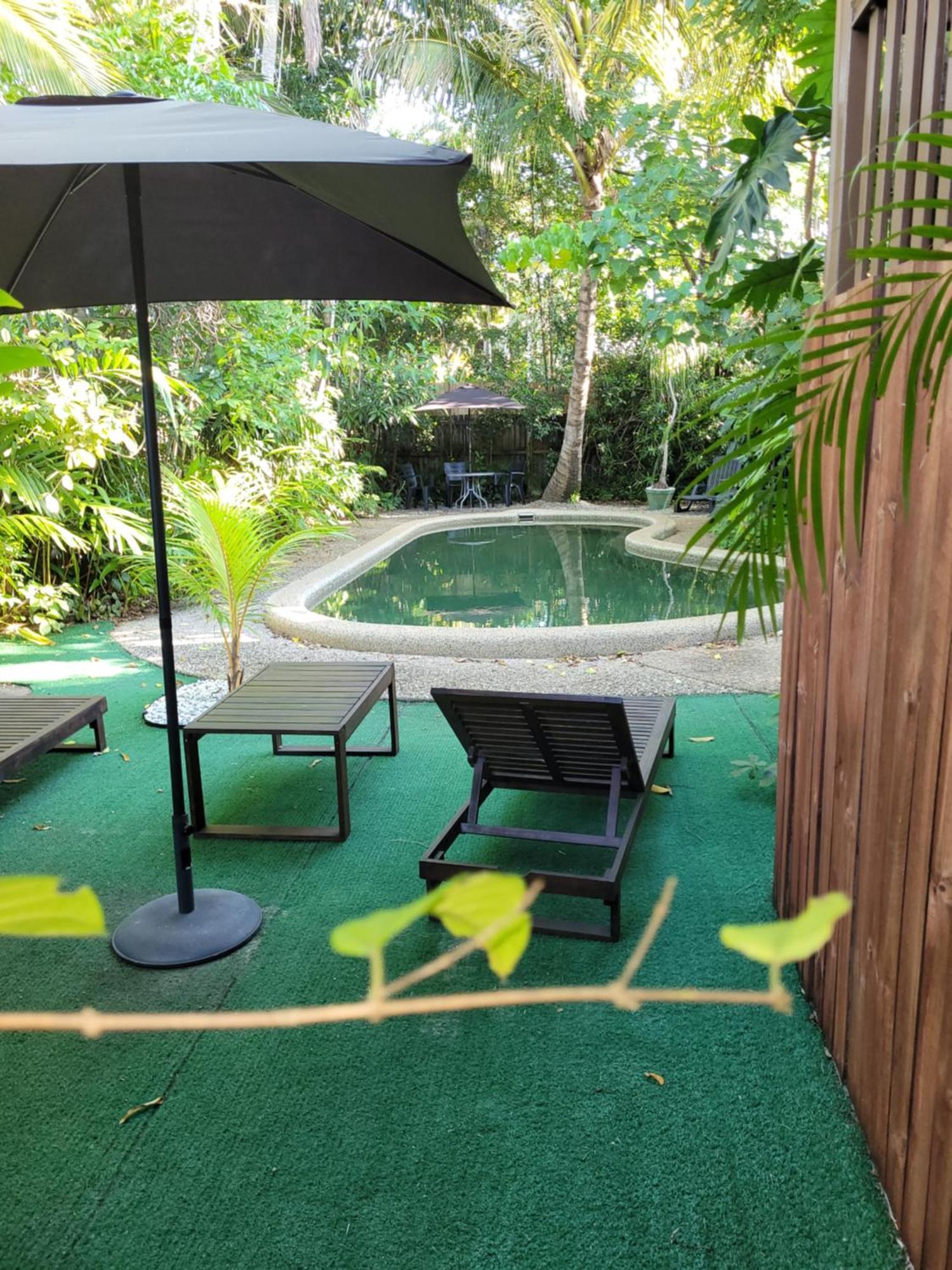 Travellers Paradise Кернс Екстериор снимка A private pool at a resort in Thailand
